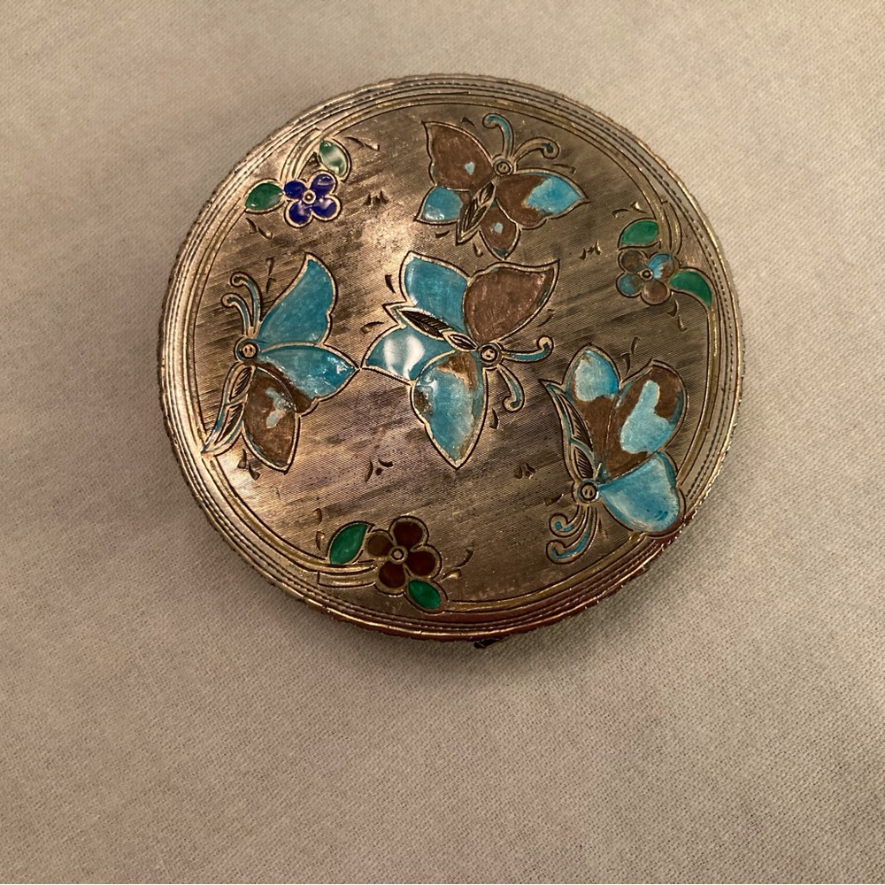 Antique round sterling silver compact with etched and enameled detail botanica